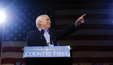 John McCain at podium with Country First slogan