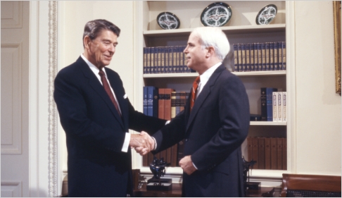 John McCain and Ronald Reagan shaking hands